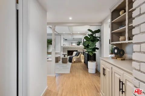 a view of a living room and dining room