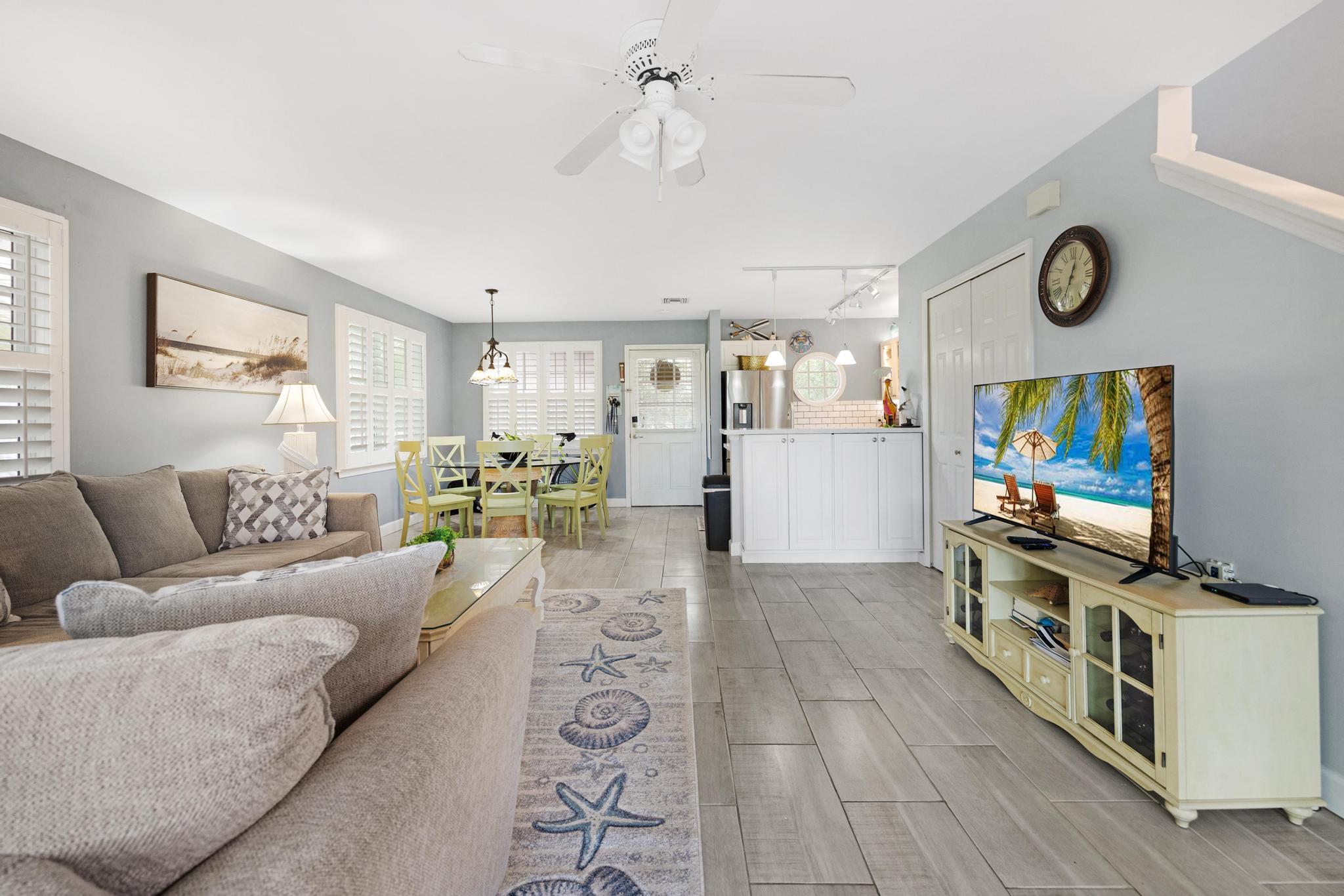 30 Whistling Duck Lane Key West, FL 33040 - Photo 2 of 38 a living room with furniture and a flat screen tv