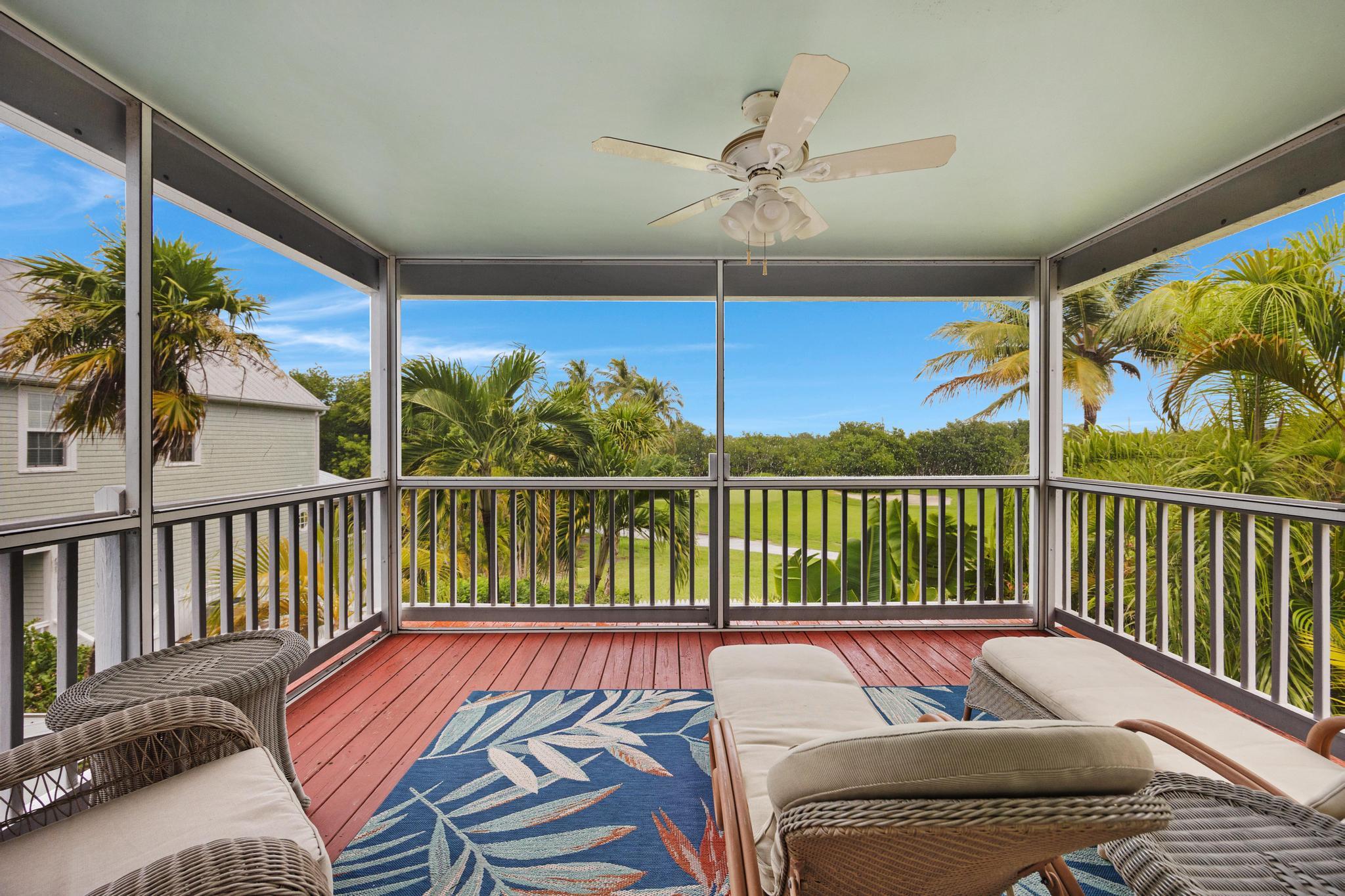 30 Whistling Duck Lane Key West, FL 33040 - Photo 27 of 38 a balcony with furniture