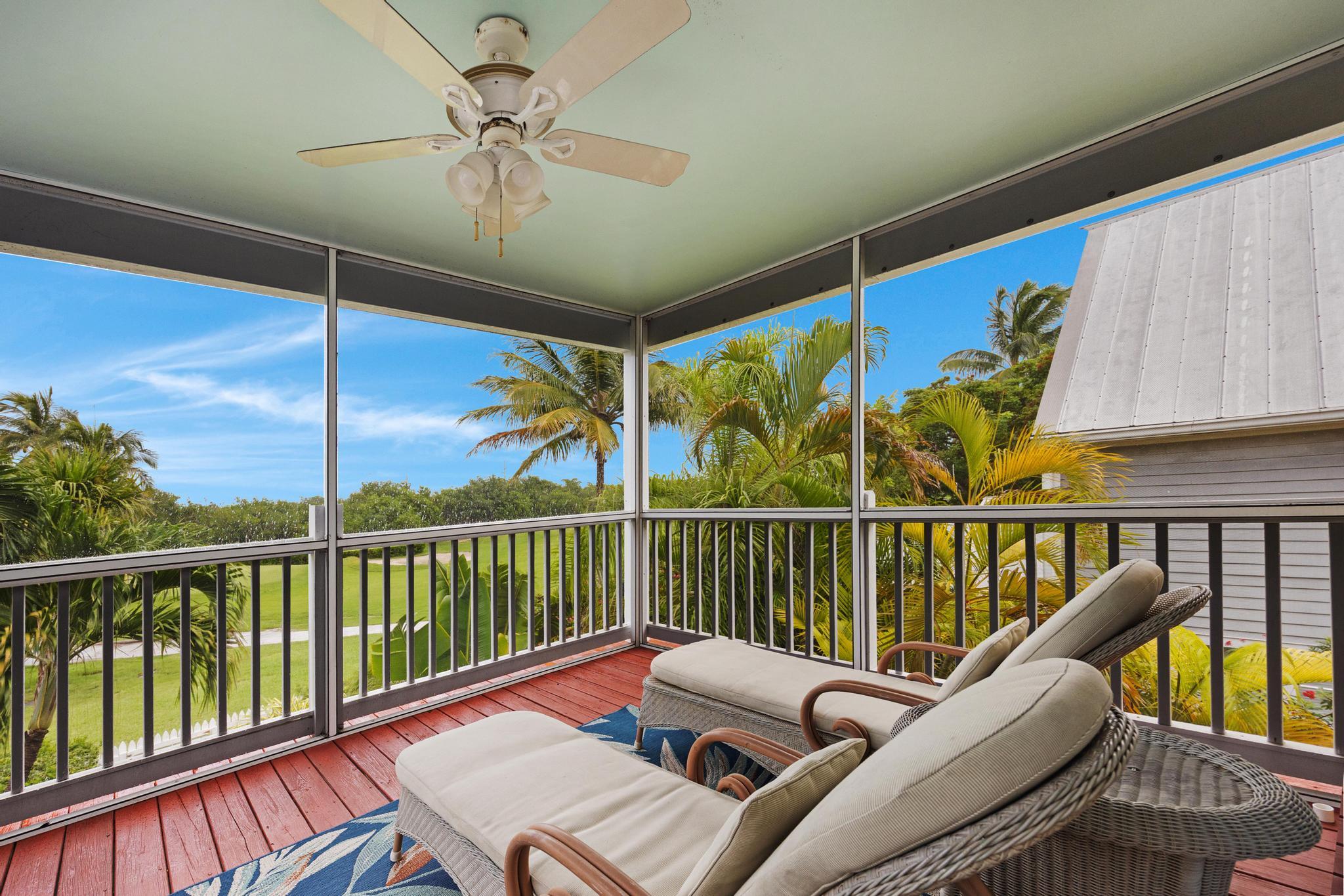 30 Whistling Duck Lane Key West, FL 33040 - Photo 28 of 38 a balcony with furniture