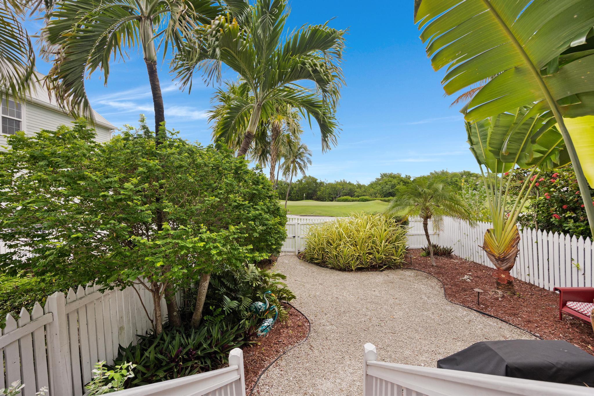30 Whistling Duck Lane Key West, FL 33040 - Photo 3 of 38 a view of a backyard
