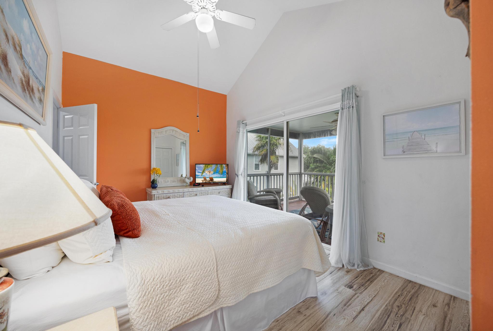 30 Whistling Duck Lane Key West, FL 33040 - Photo 33 of 38 a bedroom with a bed and a large window