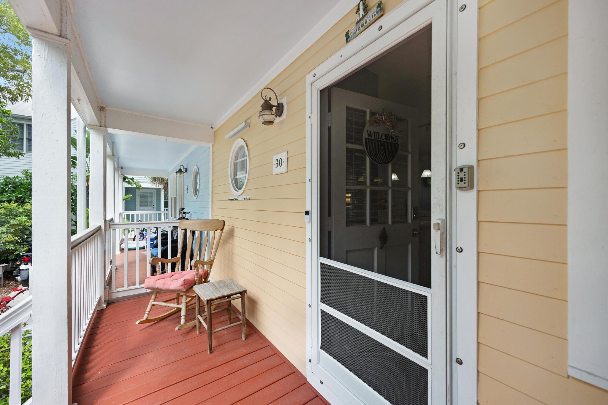 30 Whistling Duck Lane Key West, FL 33040 - Photo 8 of 38 a balcony view with a seating space