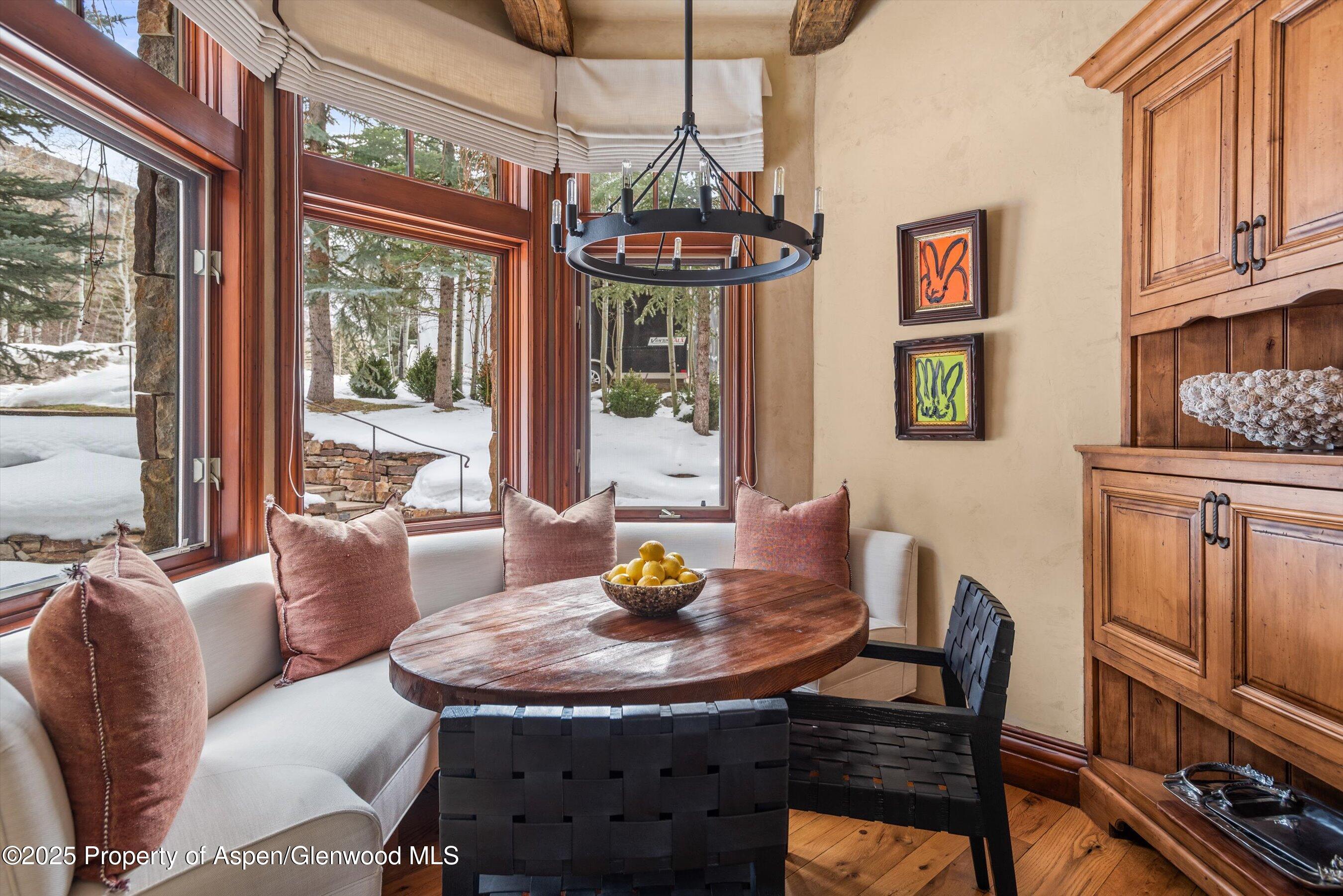 1225 Riverside Drive Aspen, CO 81611 - Photo 20 of 47 a view of a dining room with furniture window and outside view