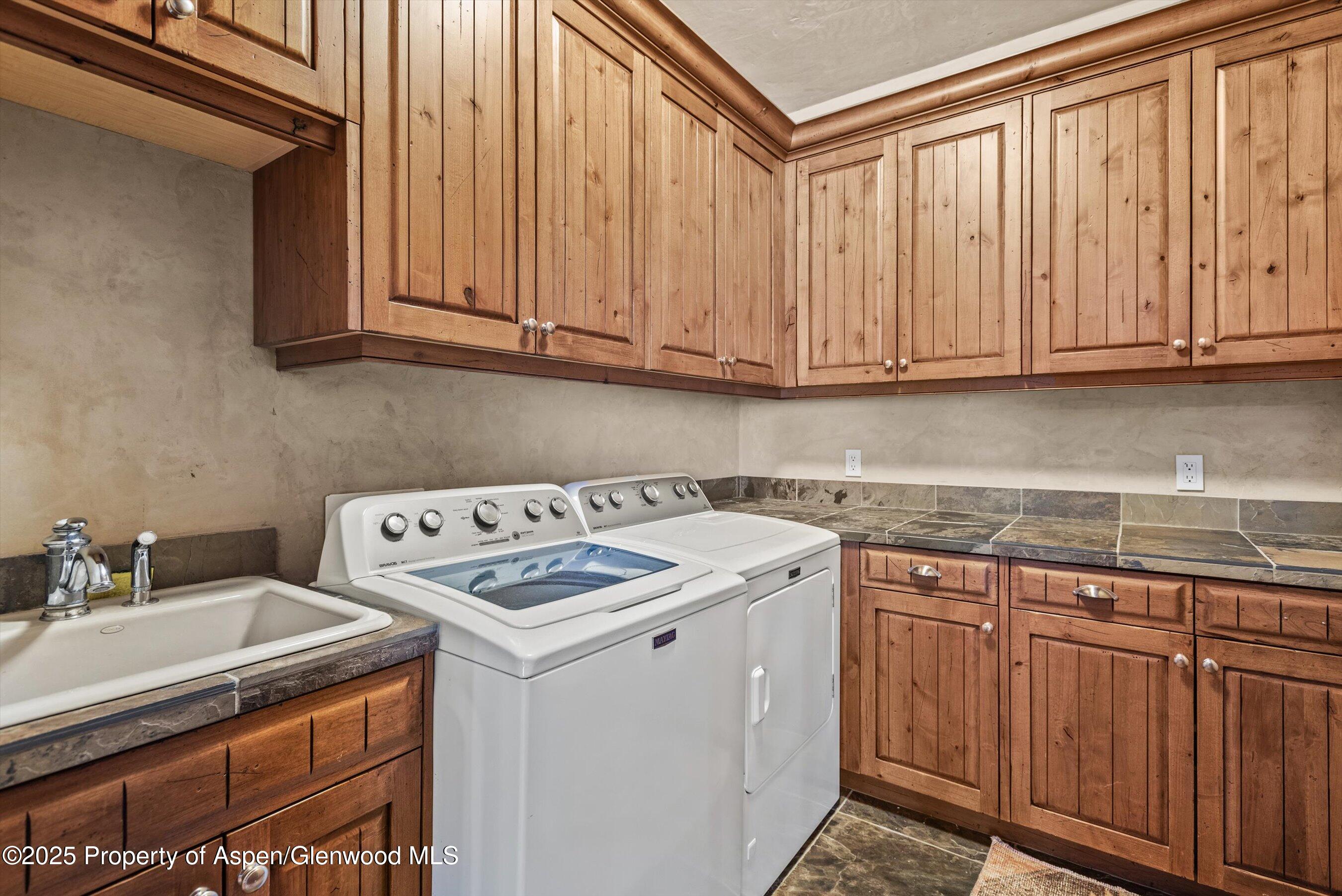 1225 Riverside Drive Aspen, CO 81611 - Photo 43 of 47 a utility room with dryer and washer