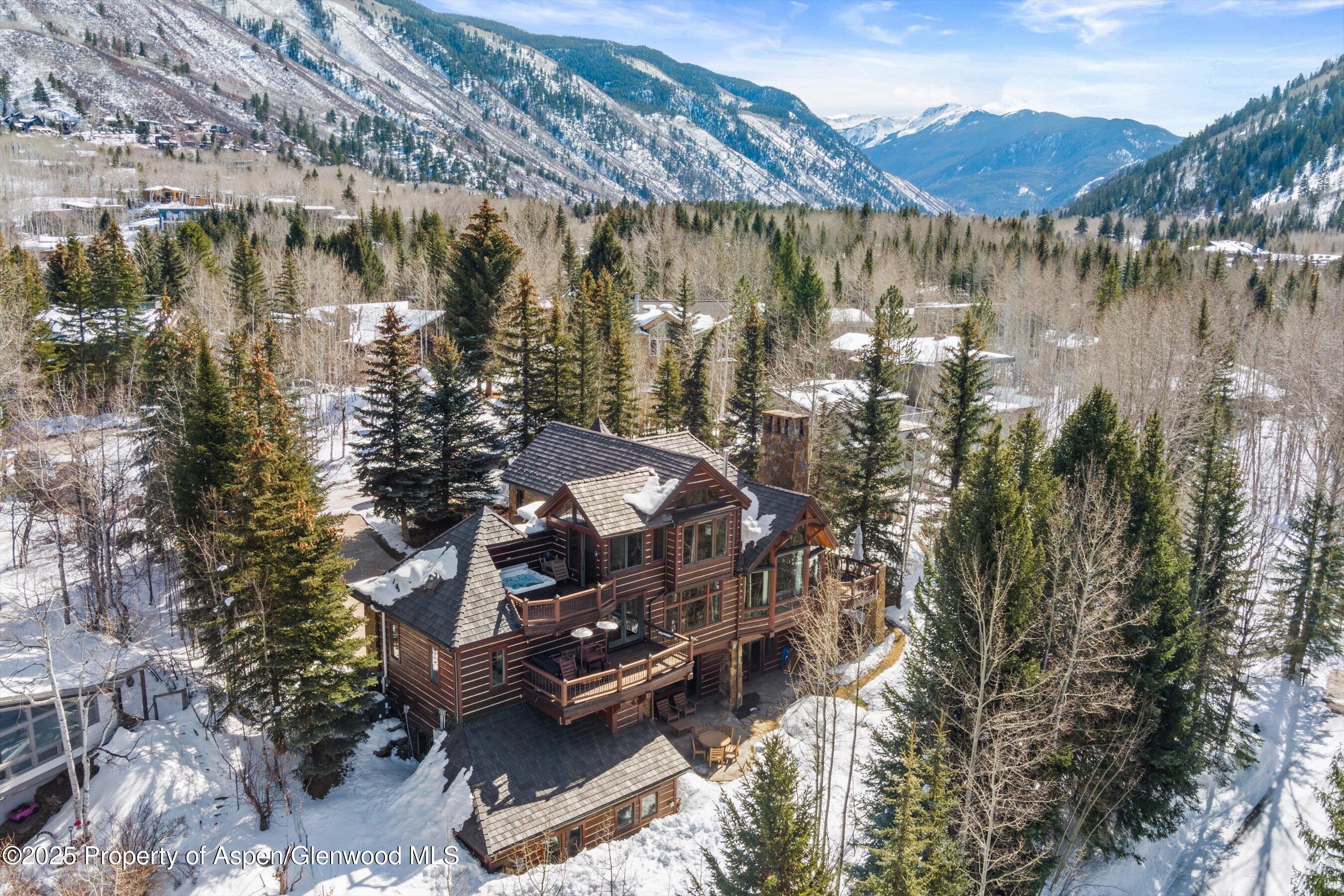 1225 Riverside Drive Aspen, CO 81611 - Photo 5 of 47 a view of a lake with a mountain in the background