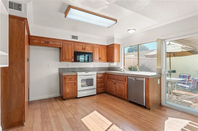 a view of a bathroom with a shower and a sink
