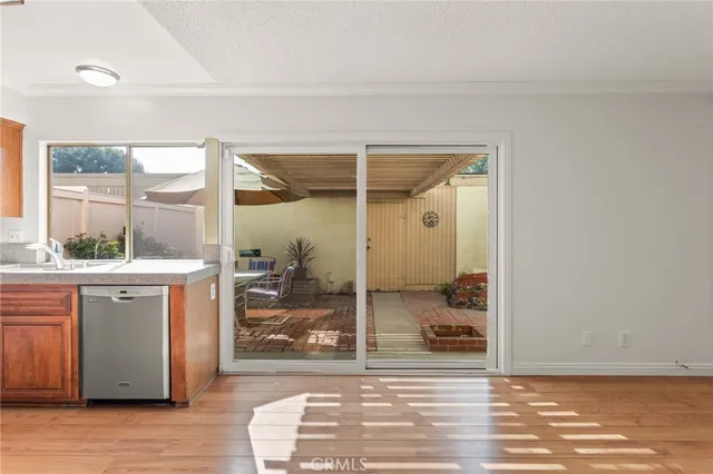 a view of a bathroom with a shower and a sink