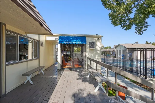 a view of a park with large trees