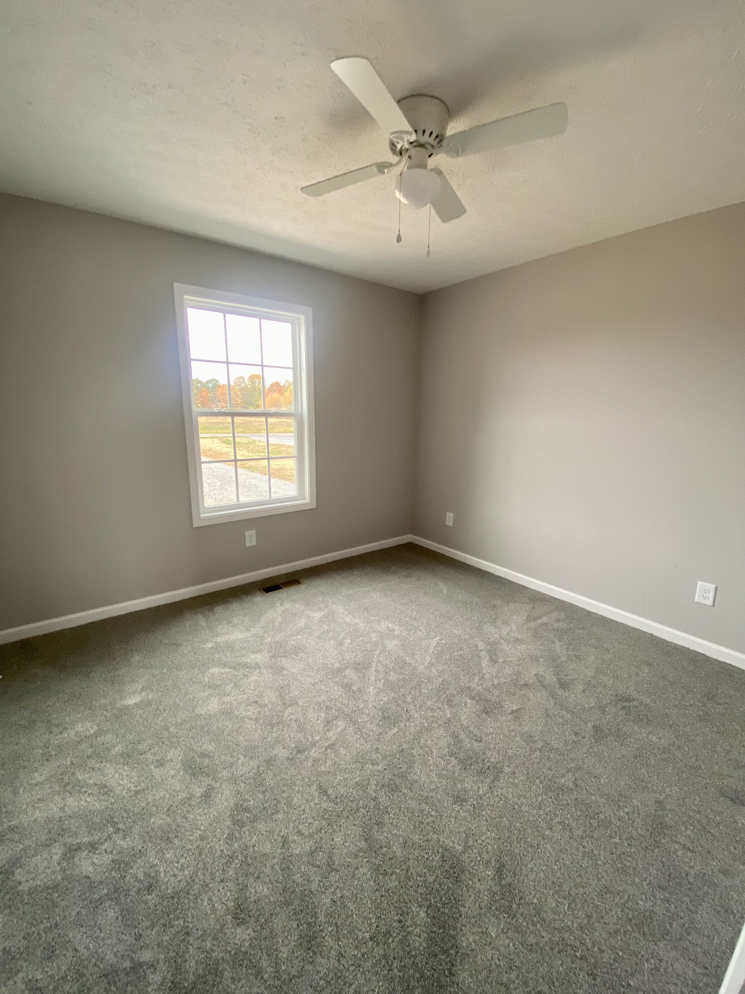 104 Fleming Road Portland, TN 37148 - Photo 18 of 22 an empty room with a window