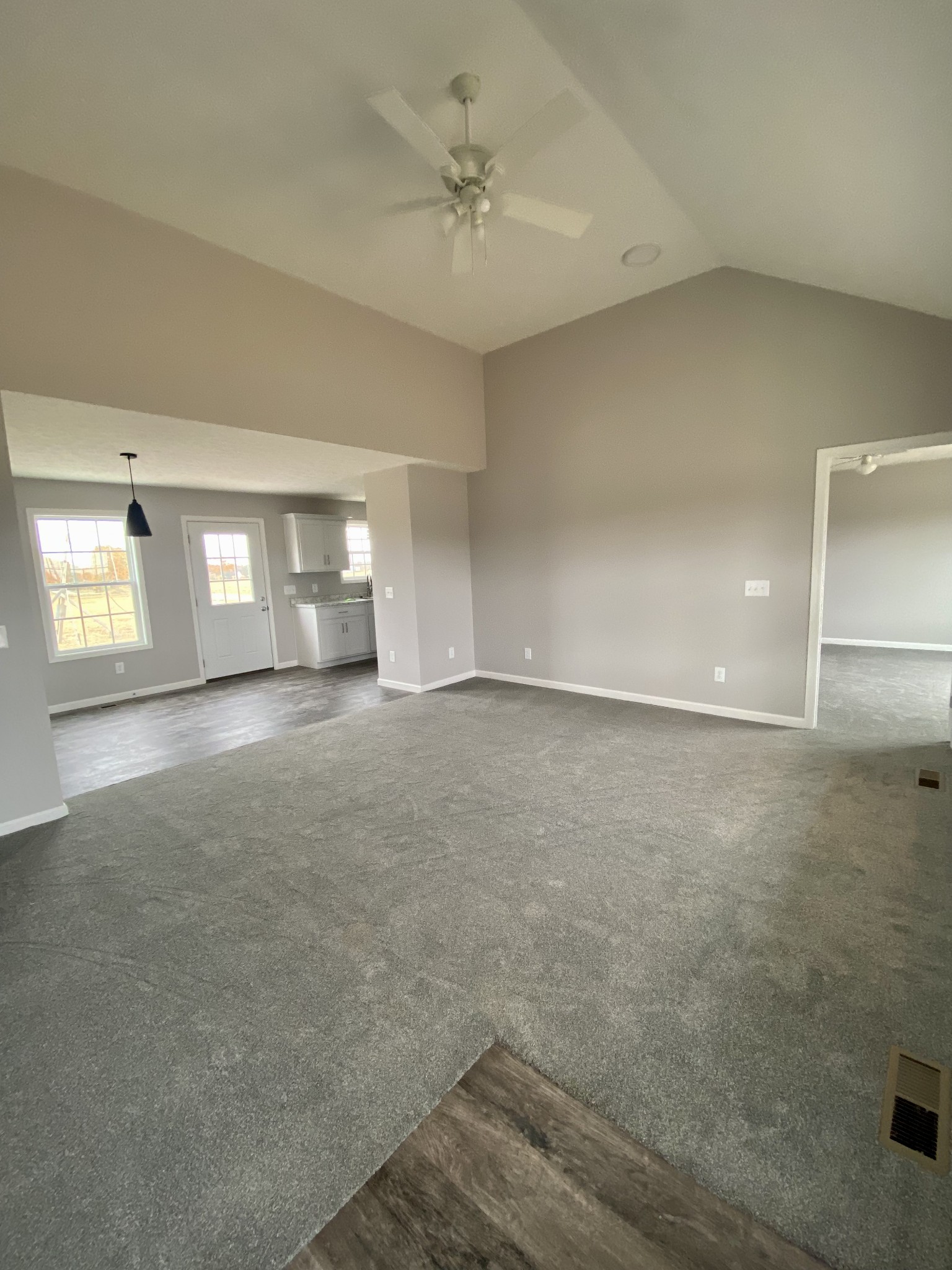 104 Fleming Road Portland, TN 37148 - Photo 4 of 22 wooden floor in an empty room with a window