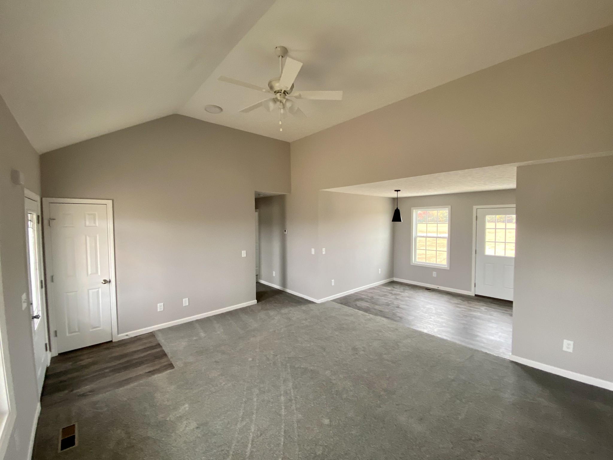 104 Fleming Road Portland, TN 37148 - Photo 5 of 22 an empty room with windows and fan
