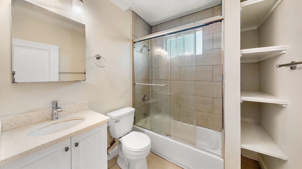 19 Perrin Street, Unit 2 Boston, MA 02119 - Photo 9 of 9 a bathroom with a sink toilet and shower