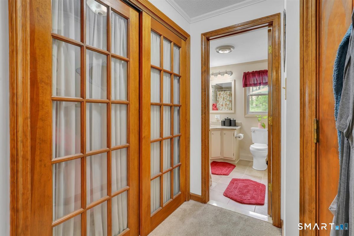 197 Dana Lane Meriden, CT 06451 - Photo 14 of 35 a view of a hallway with a dining area