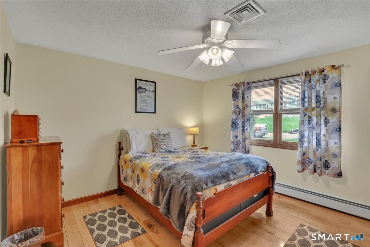 197 Dana Lane Meriden, CT 06451 - Photo 16 of 35 a bedroom with a bed and a window