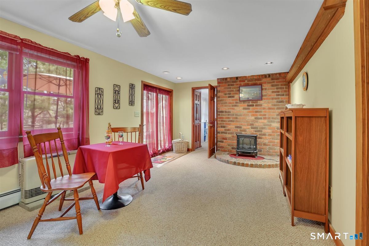 197 Dana Lane Meriden, CT 06451 - Photo 19 of 35 a view of a dining room with furniture window and outside view