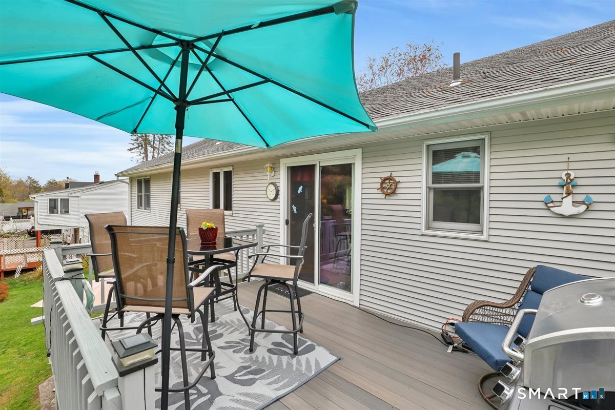 197 Dana Lane Meriden, CT 06451 - Photo 27 of 35 a table and chairs in patio of the house