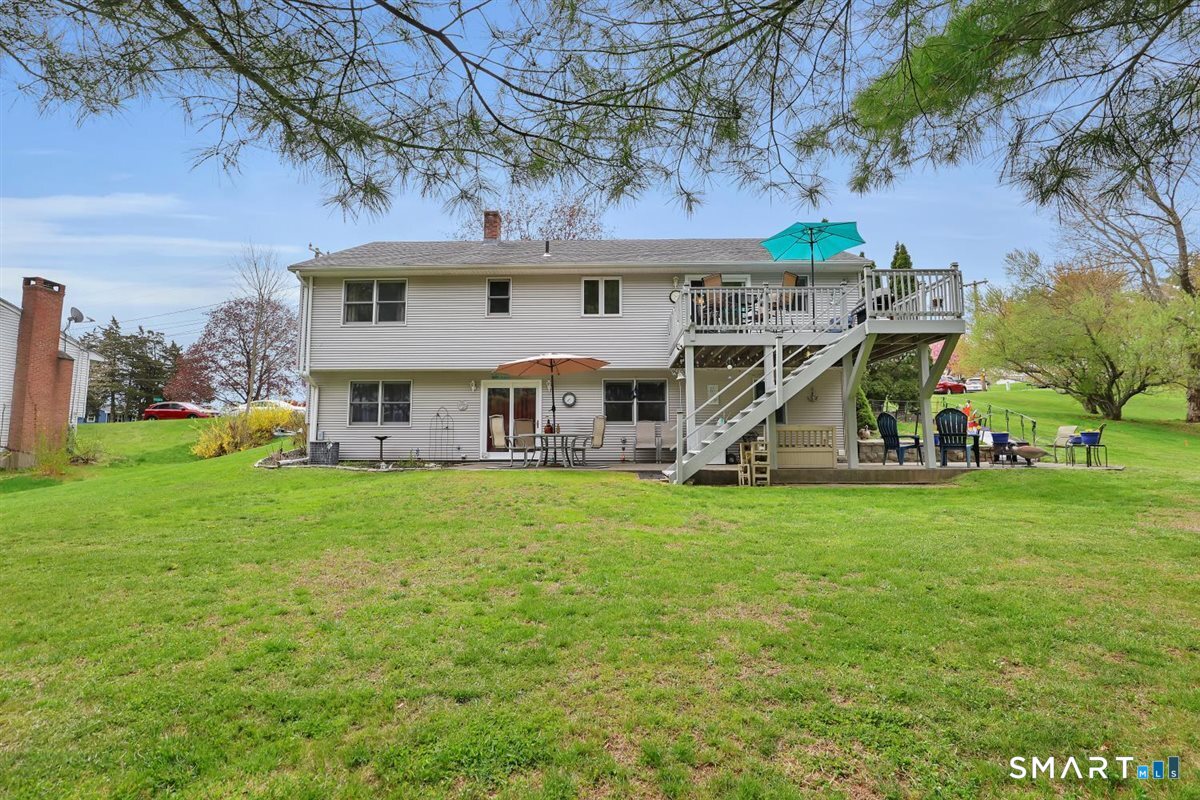 197 Dana Lane Meriden, CT 06451 - Photo 30 of 35 front view of a house with a big yard