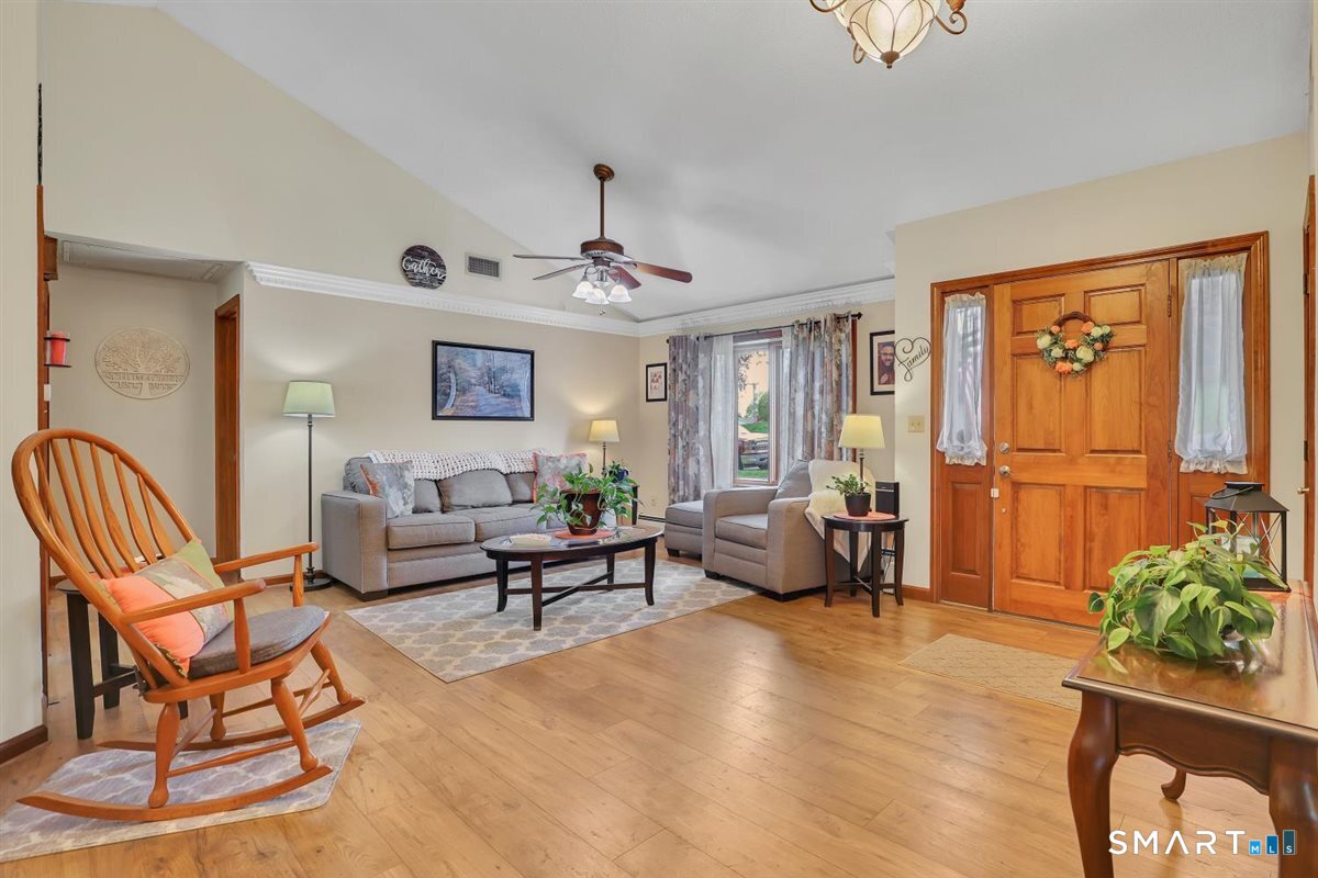 197 Dana Lane Meriden, CT 06451 - Photo 6 of 35 a living room with furniture and wooden floor