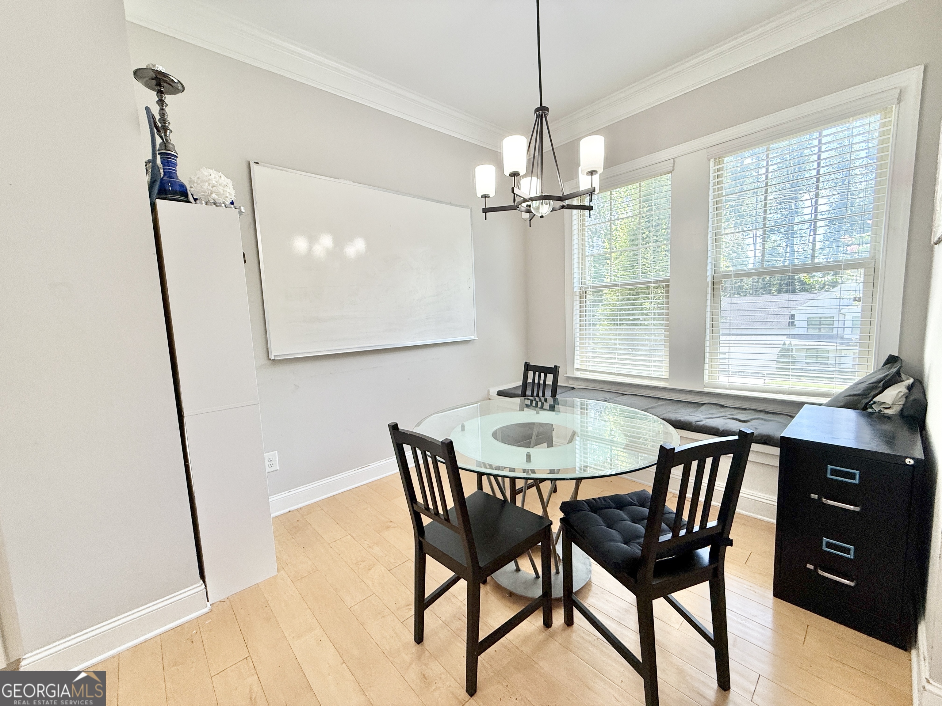 1817 Hislop Lane Atlanta, GA 30345 - Photo 12 of 32 a view of a dining room with furniture window and wooden floor