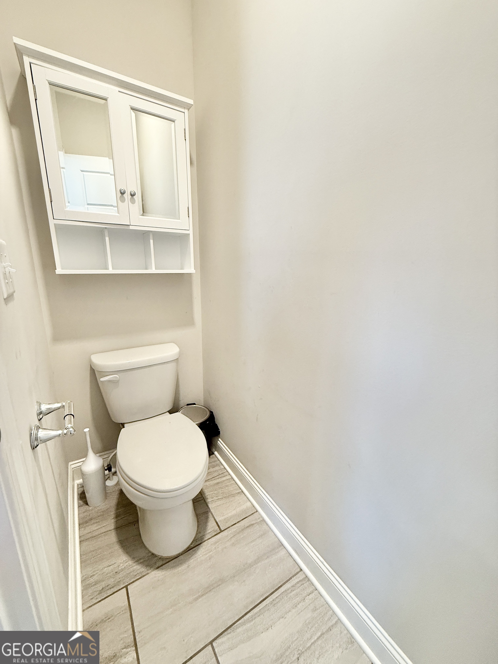 1817 Hislop Lane Atlanta, GA 30345 - Photo 20 of 32 a bathroom with a toilet
