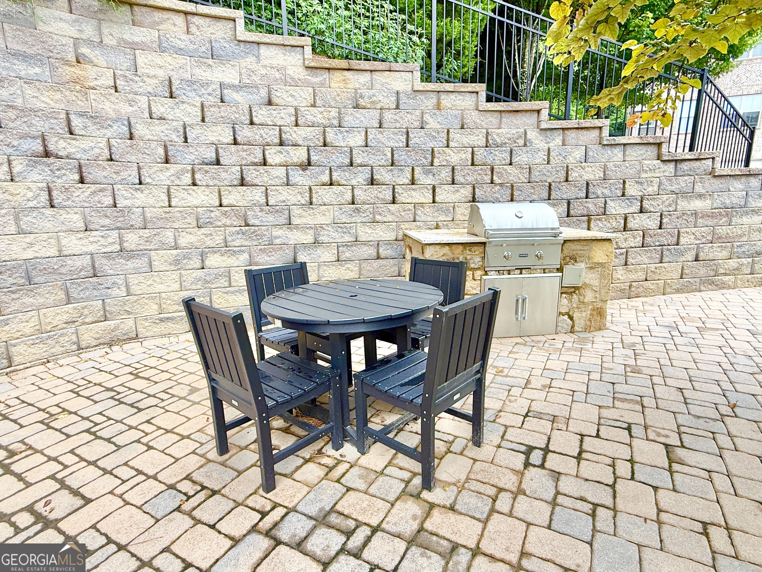 1817 Hislop Lane Atlanta, GA 30345 - Photo 31 of 32 a view of a backyard with table and chairs