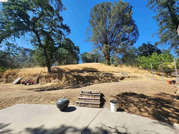 a view of water view of a backyard of the house