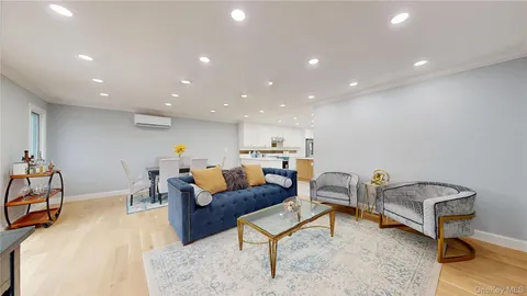 a living room with furniture and a couch