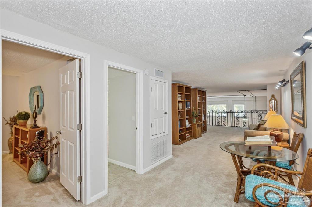 1261 Mahogany Mill Road Pensacola, FL 32507 - Photo 13 of 21 a living room with furniture and a window