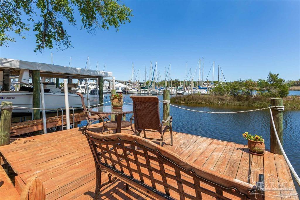 1261 Mahogany Mill Road Pensacola, FL 32507 - Photo 3 of 21 a view of a chairs and table in the terrace