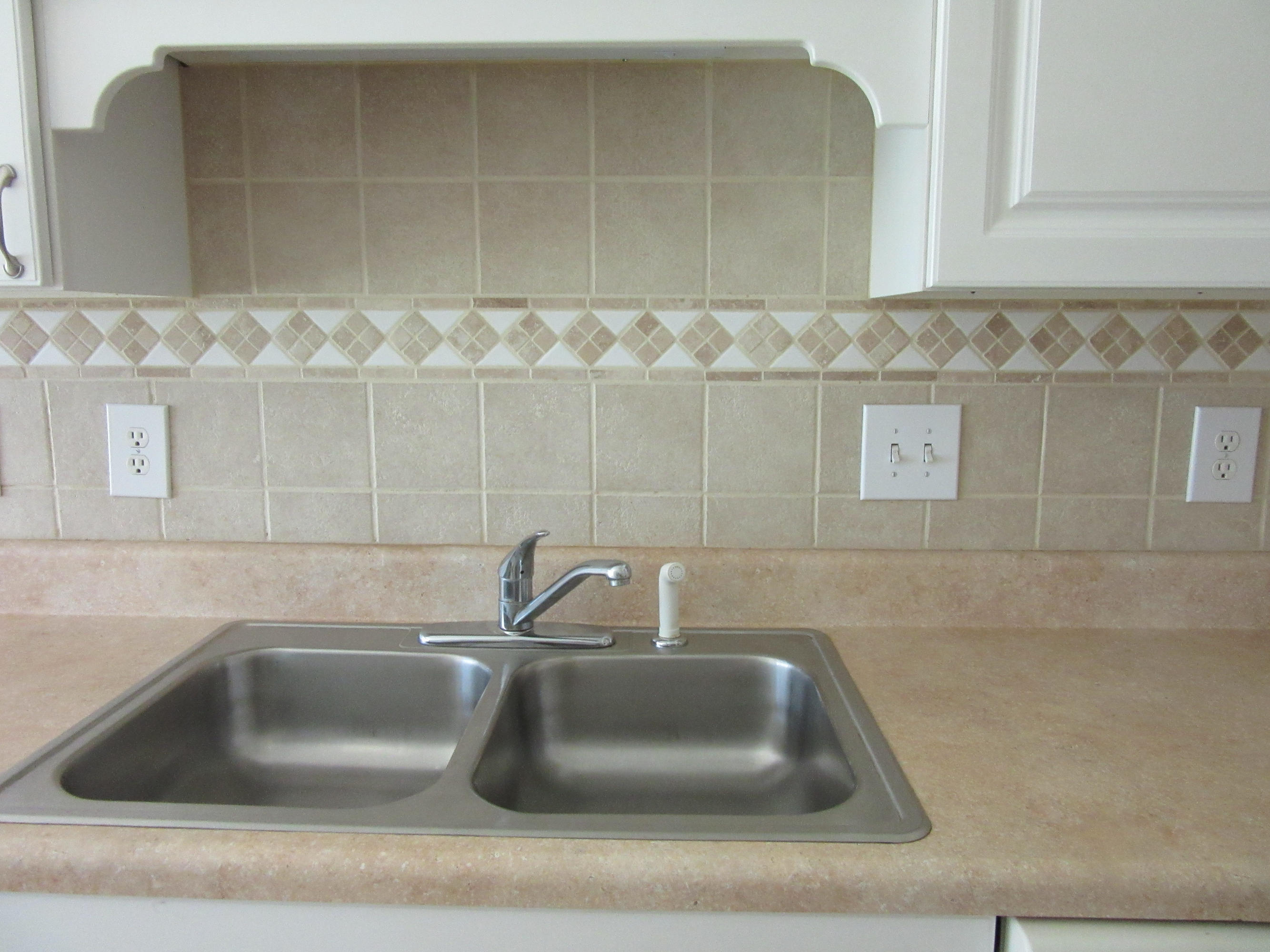 8206 Delhi Road North Charleston, SC 29406 - Photo 12 of 29 backsplash over kitchen sink