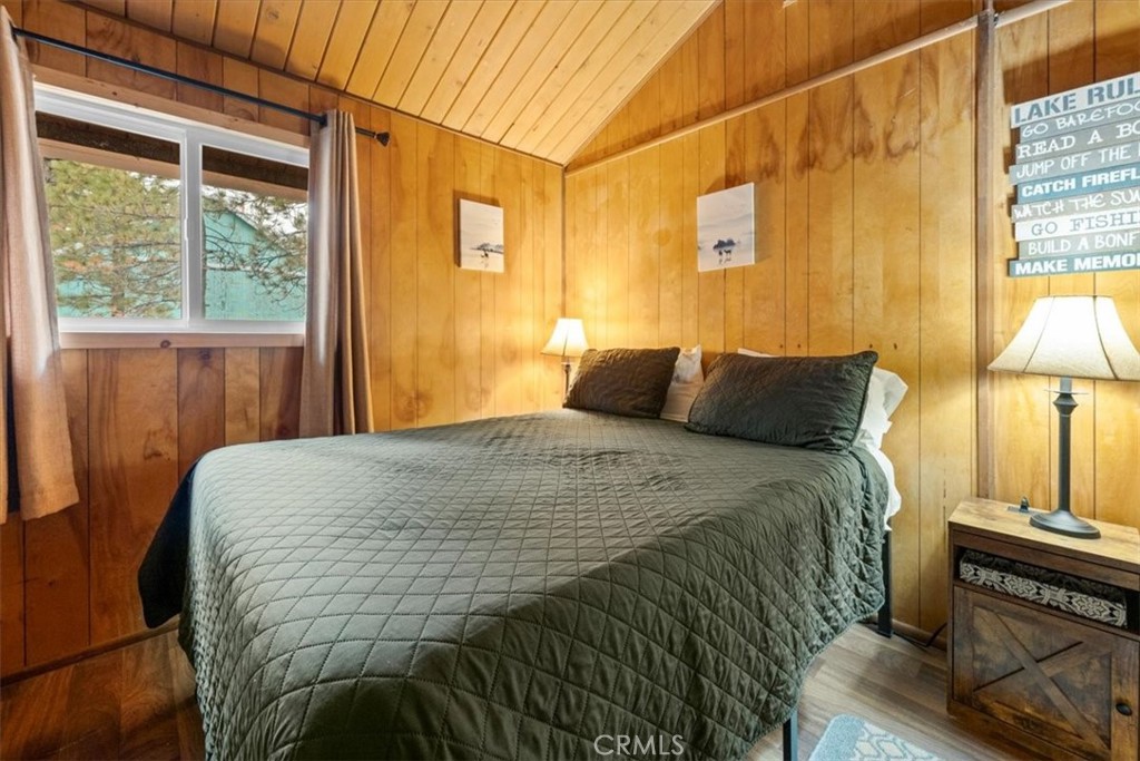 567 Highland Road Big Bear Lake, CA 92315 - Photo 30 of 42 a bedroom with a bed and with a window