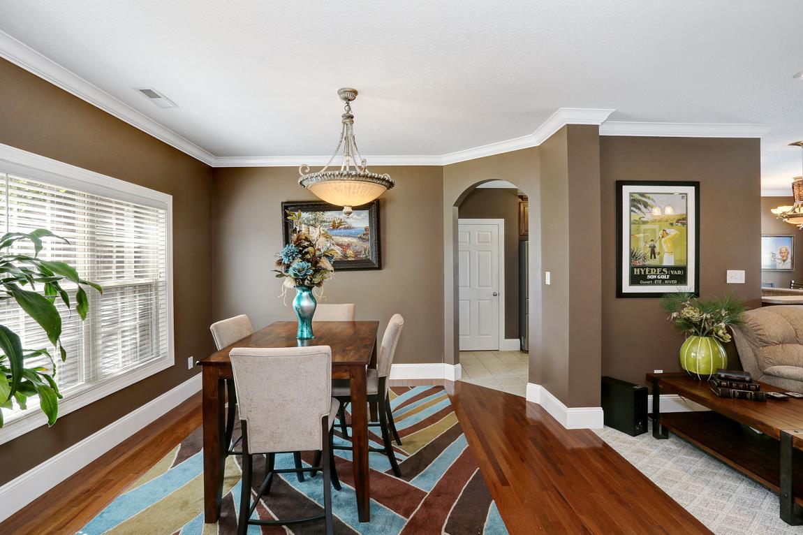 24811 Drawbaugh Road Athens, AL 35613 - Photo 3 of 30 Dining Room - With crown molding and hardwood flooring.