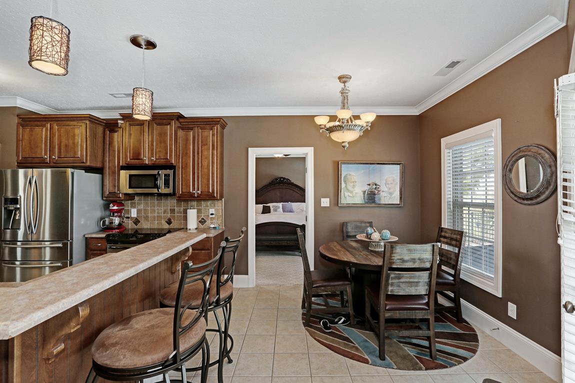24811 Drawbaugh Road Athens, AL 35613 - Photo 7 of 30 Breakfast Area - With crown molding and tile flooring.