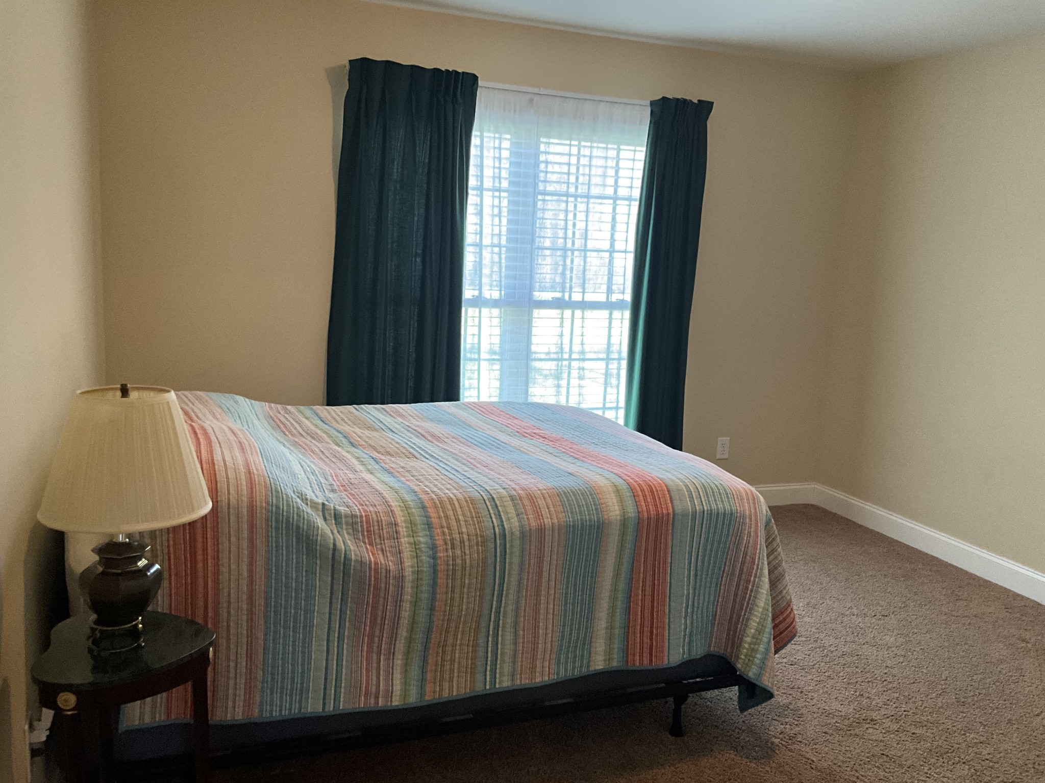 2511 Chambliss Road Pleasant View, TN 37146 - Photo 14 of 24 a bedroom with a bed and window