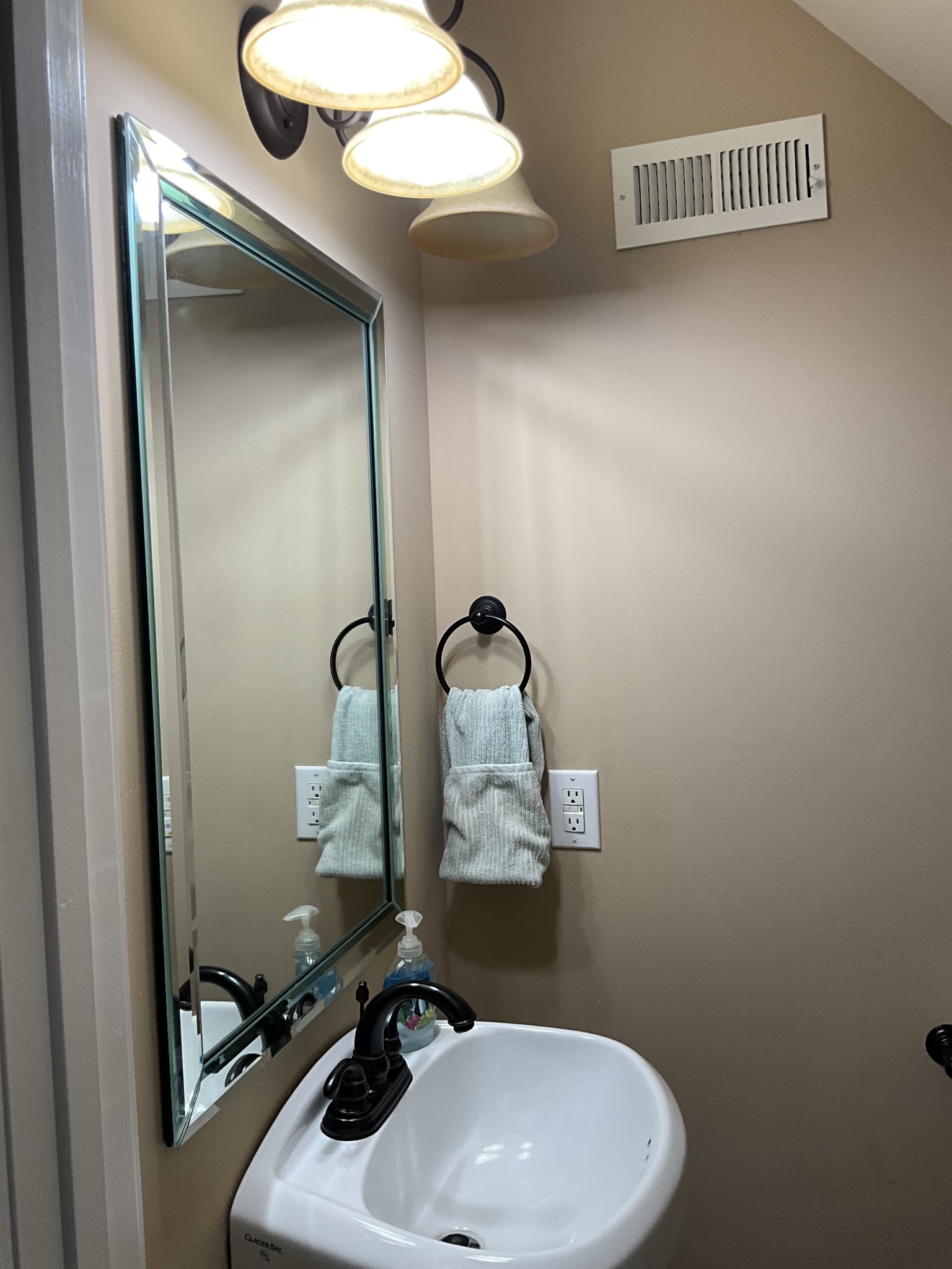 2511 Chambliss Road Pleasant View, TN 37146 - Photo 17 of 24 a bathroom with a sink and a mirror