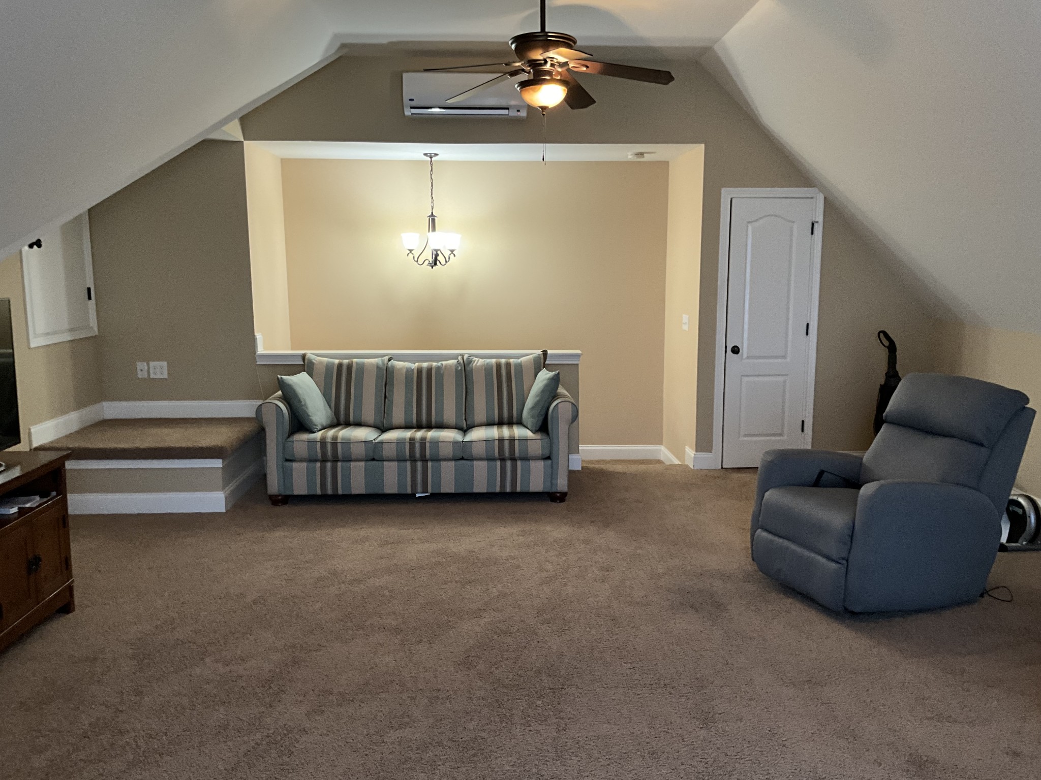 2511 Chambliss Road Pleasant View, TN 37146 - Photo 18 of 24 a living room with furniture and a chandelier