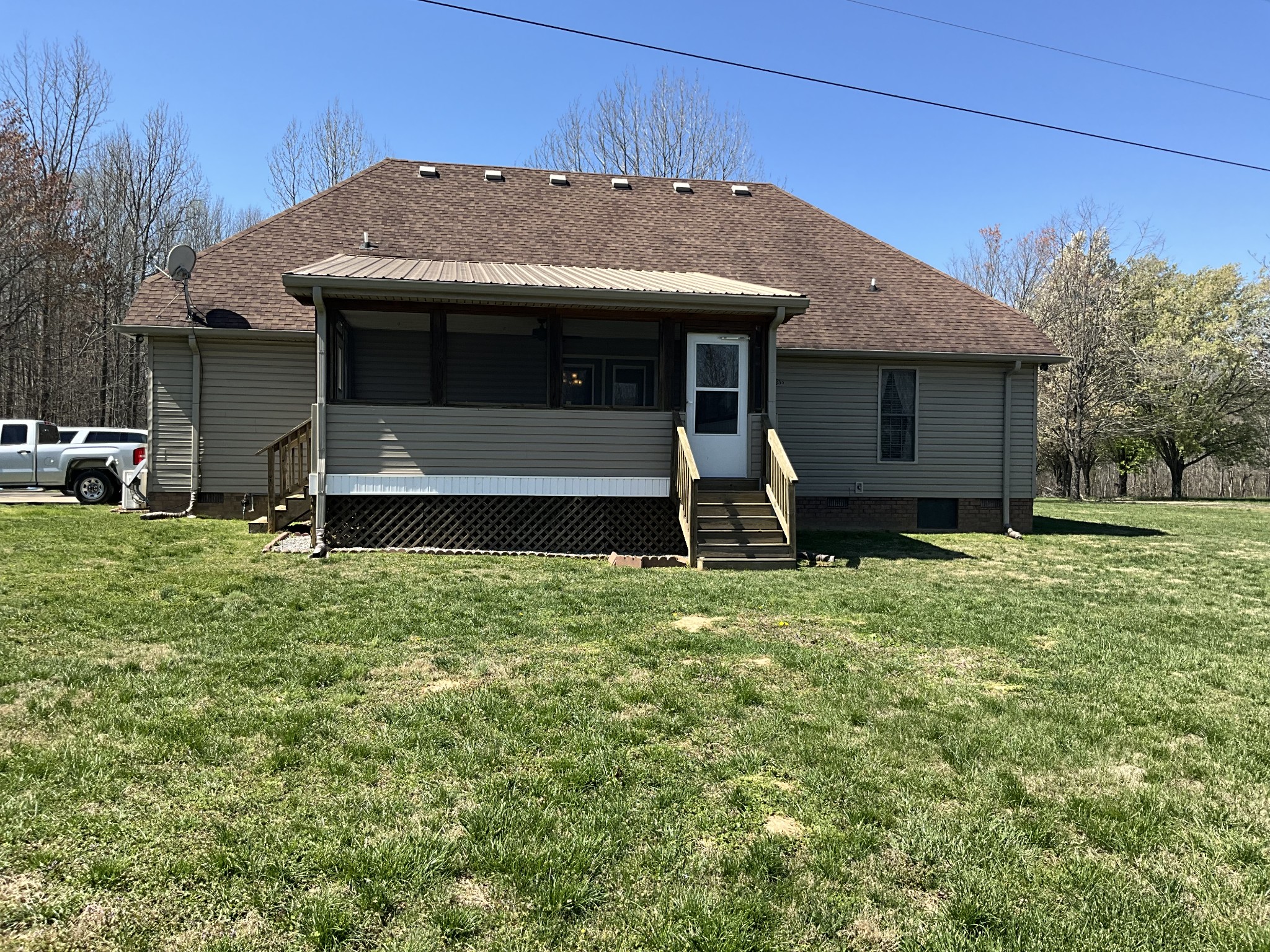 2511 Chambliss Road Pleasant View, TN 37146 - Photo 22 of 24 a front view of a house with a yard