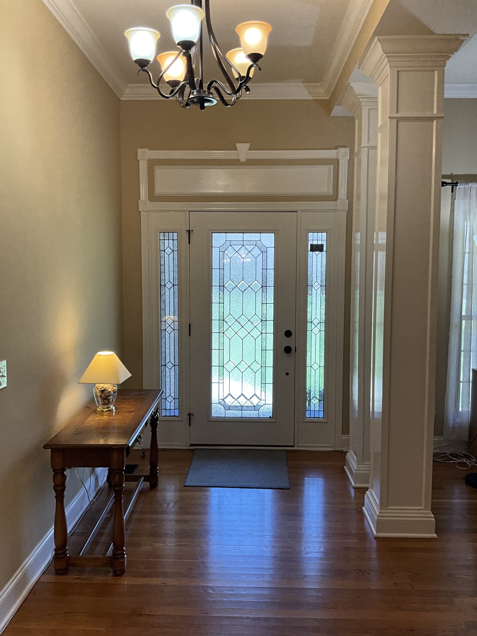 2511 Chambliss Road Pleasant View, TN 37146 - Photo 3 of 24 a living room with furniture and a chandelier
