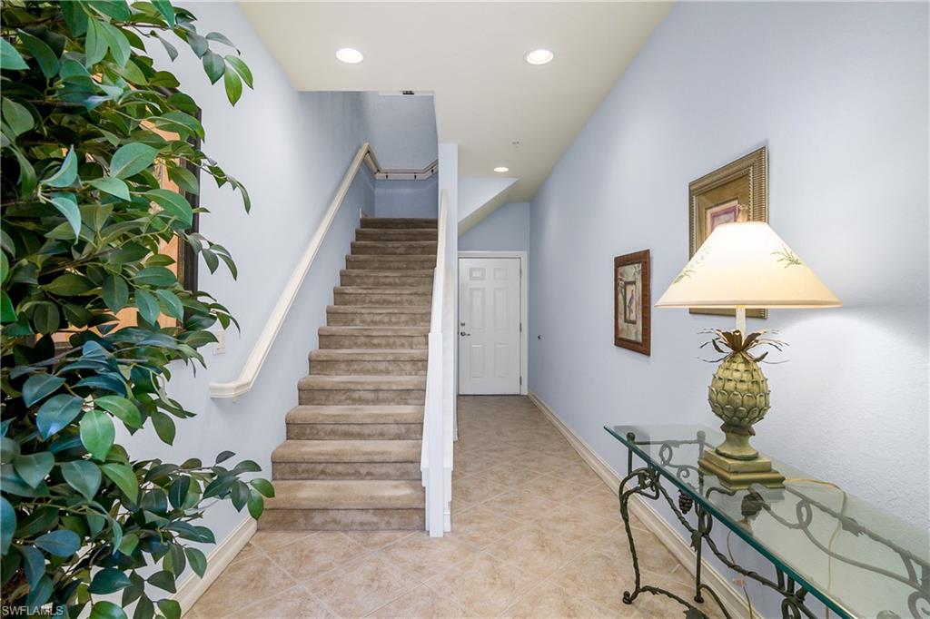 9108 Capistrano Street South, Unit 7402 Naples, FL 34113 - Photo 2 of 50 a view of entryway and hall