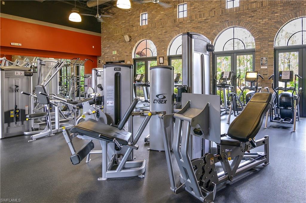 9108 Capistrano Street South, Unit 7402 Naples, FL 34113 - Photo 41 of 50 a view of a room with gym equipment