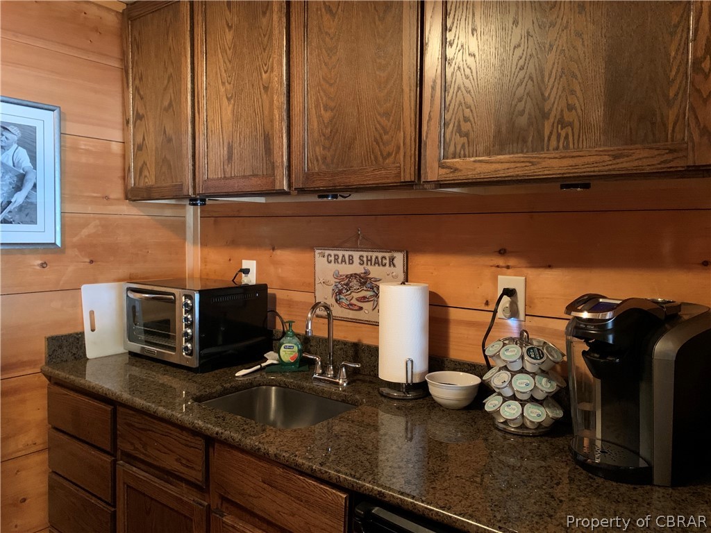 1167 Johns Neck Road Weems, VA 22576 - Photo 30 of 48 a kitchen with a sink and cabinets