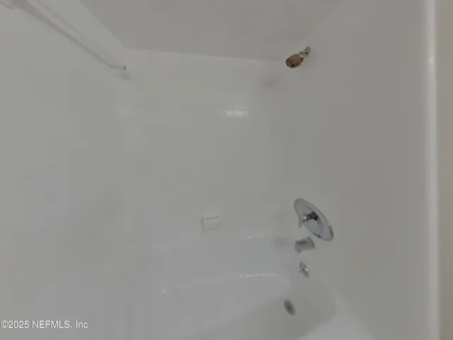 a bathroom with a bathtub