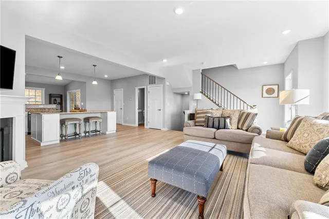 a kitchen with a sink stove and refrigerator