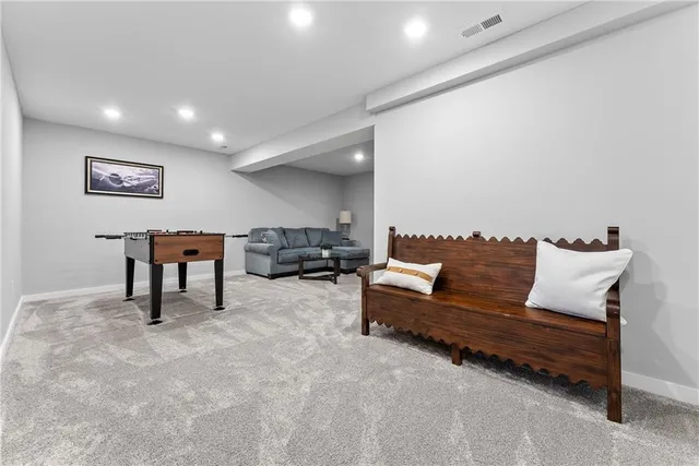 a living room with furniture and a couch