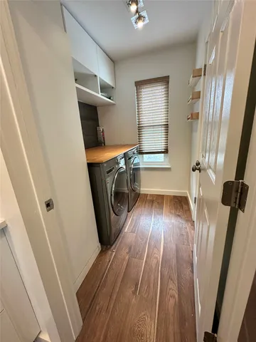 a view of wooden floor and staircase