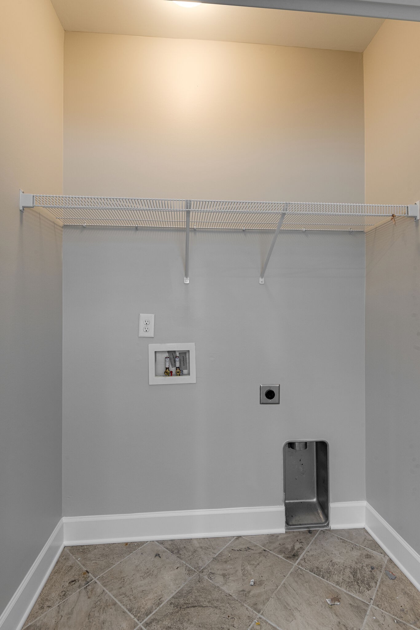 269 Mary Ann Circle Spring Hill, TN 37174 - Photo 12 of 28 a view of a room with racks on the wall