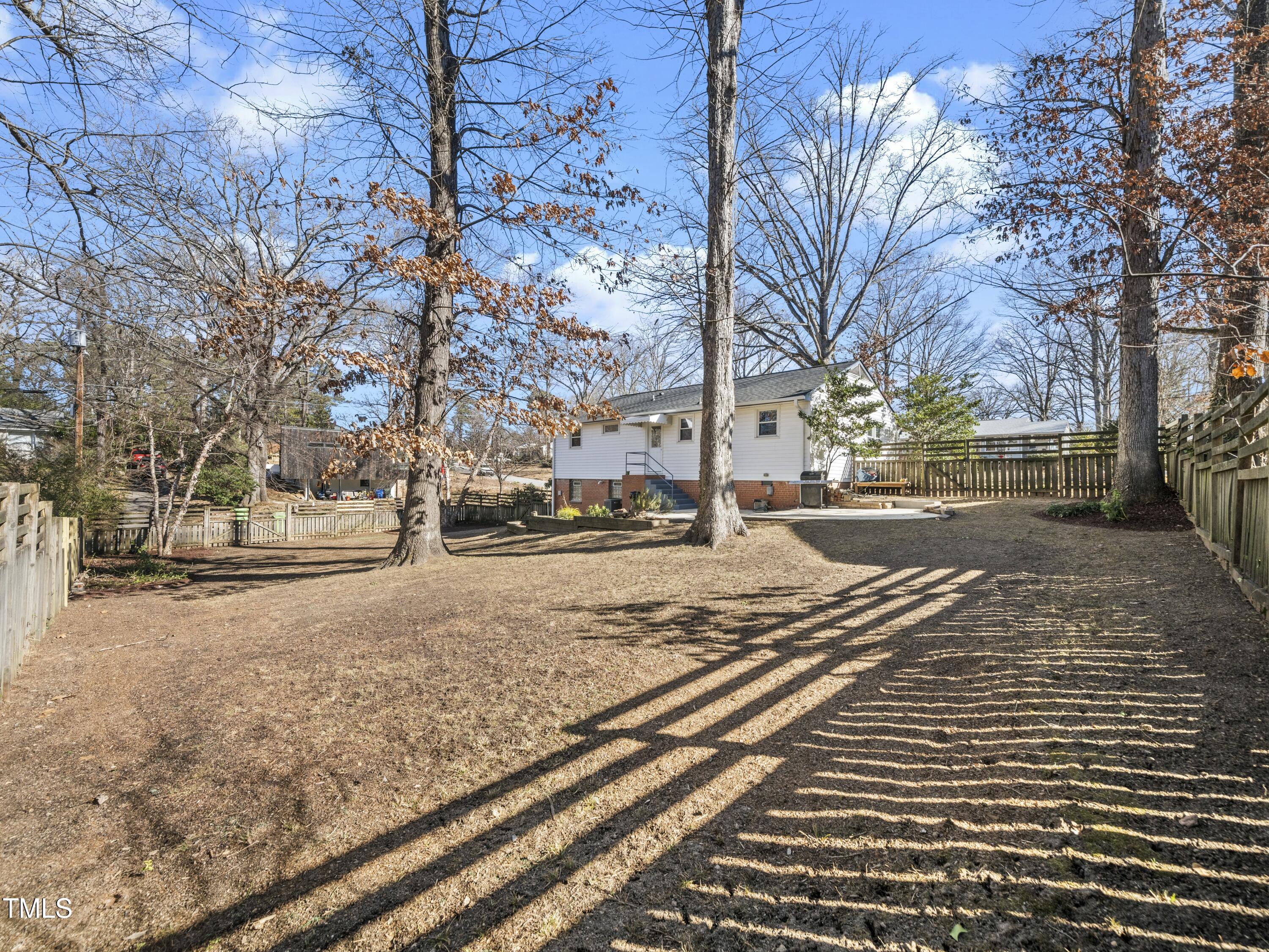 2011 Watkins Street Raleigh, NC 27604 - Photo 21 of 36 a view of road with trees