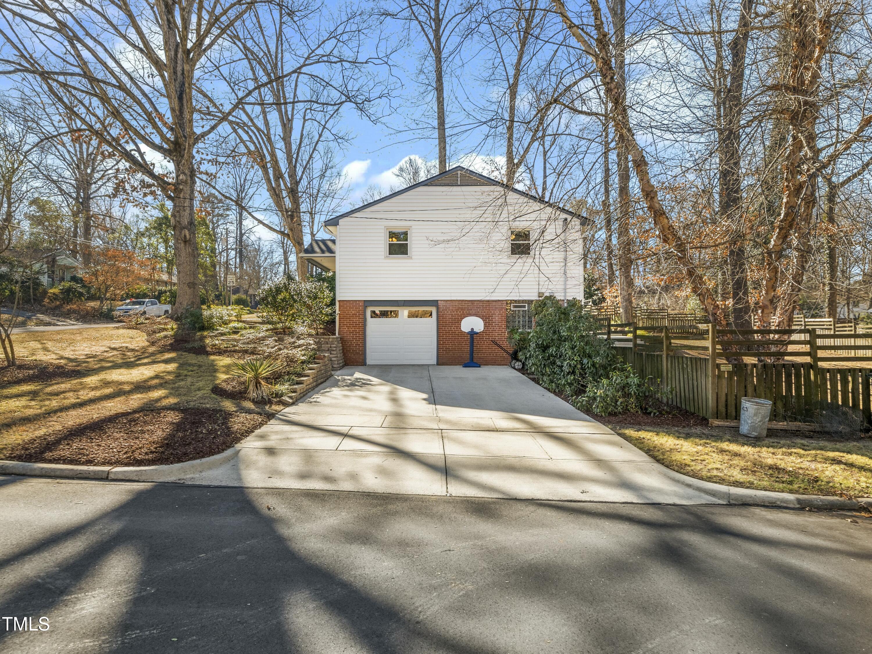 2011 Watkins Street Raleigh, NC 27604 - Photo 24 of 36 a view of a street with a building