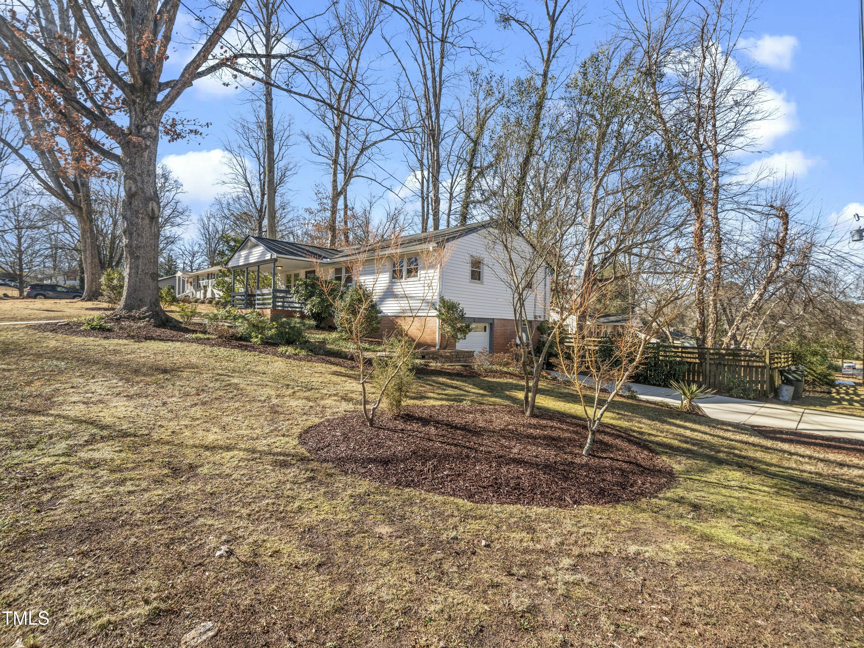 2011 Watkins Street Raleigh, NC 27604 - Photo 25 of 36 a view of a park with a tree